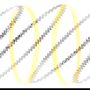 CHINESE 24K GOLD HAND ENGRAVED BANGLE BRACELETS.: A pair of 24k yellow gold (stamped .9999) hand engraved bangle bracelets, 4 mm wide, 7 inch wrist, Chinese markings, 24 grams.