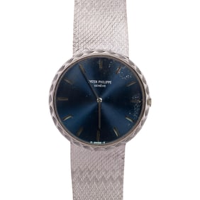 18K WHITE GOLD PATEK PHILIPPE WRIST WATCH.