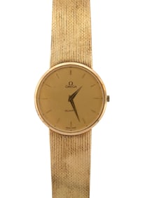 VINTAGE 14K GOLD OMEGA WRIST WATCH.
