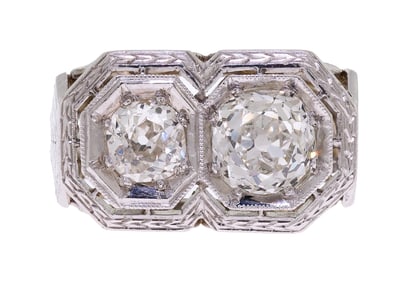 ANTIQUE FILIGREE PLATINUM ”TOI ET MOI” DIAMOND RING.