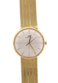 VINTAGE 18K GOLD JAEGER LECOULTRE WRIST WATCH.