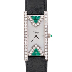 ASPREY & GARRARD 18K GOLD EMERALD & DIAMOND WATCH.