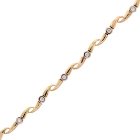 14K YELLOW GOLD DIAMOND NECKLACE.