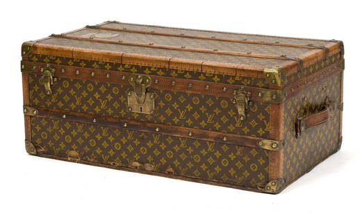 LOUIS VUITTON CABIN TRUNK.: A Louis Vuitton monogramed cabin trunk, with three original inner trays, original paper label, and two keys. Serial number 192281, numbered 038019. 32”L x 18.5”D x 13.5”H.