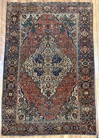 ANTIQUE FERAHAN SAROUK SCATTER RUG.