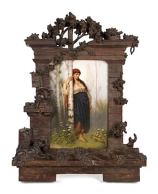 K.P.M. PLAQUE IN CARVED FRAME.