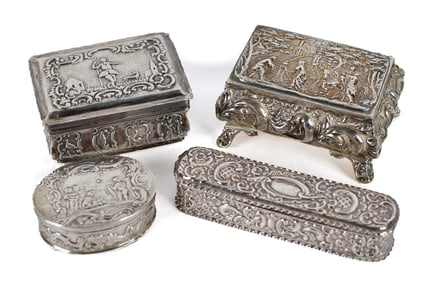 FOUR ANTIQUE EMBOSSED SILVER BOXES, FIGURAL MOTIFS.