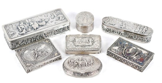 SEVEN ANTIQUE EMBOSSED CONTINENTAL SILVER BOXES.