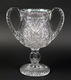 AMERICAN CUT GLASS HANDLED CHALICE.
