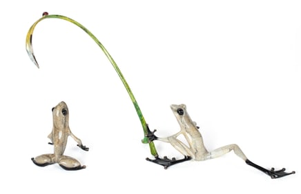 TWO TIM COTTERILL BRONZE FROGS.