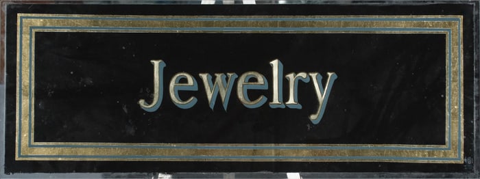 VINTAGE REVERSE PAINTED GLASS SIGN, JEWELRY.
