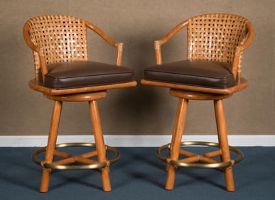 PAIR MCGUIRE TAN LEATHER SWIVEL BAR STOOLS.
