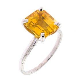 14K WHITE GOLD YELLOW SAPPHIRE RING.