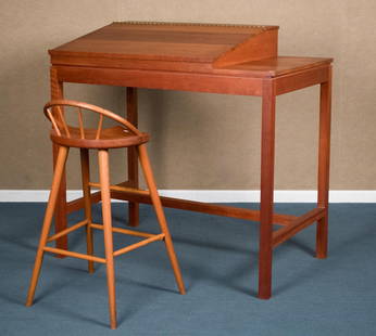 THOMAS MOSER CHERRY UPRIGHT DESK AND STOOL.: A ca. 1980 Thomas Moser signed upright cherry writing desk 48”H x 48”W x 28”D. A Thomas Moser signed cherry stool, 38”H x 18.5”W x 16”D x 31” seat H.