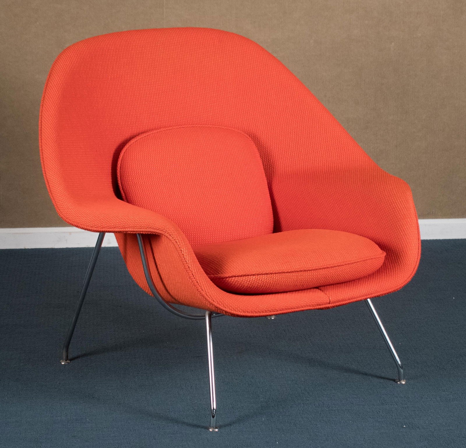 EERO SAARINEN FOR KNOLL STYLE WOMB CHAIR.: A vintage Eero Saarinen for Knoll style womb chair (no labels or markings) with chrome legs and upholstered in a textured coral fabric.35.5”H x 40.5”W x 31”D x 16” seat H.