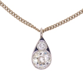 14K GOLD DIAMOND TEARDROP PENDANT & CHAIN.