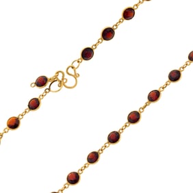 18K GOLD 20 CT. TW. GARNET NECKLACE.