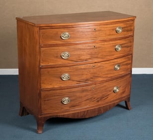 19TH C. MAHOGANY BOW FRONT CHEST.