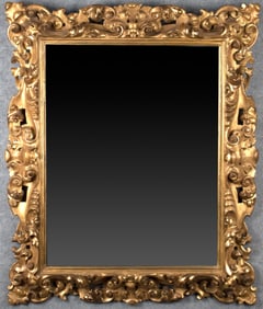 19TH C. ITALIAN CARVED AND GILT MIRROR.
