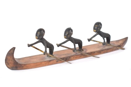 HAGENAUER FIGURES IN A BOAT.