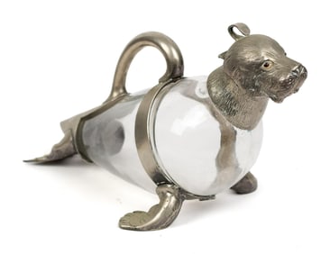 WALRUS FORM GLASS AND SILVER PLATED CLARET JUG.
