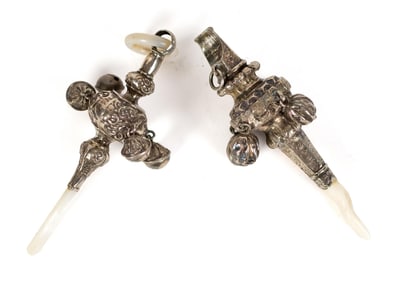 TWO ANTIQUE ENGLISH SILVER CHILD’S RATTLES.