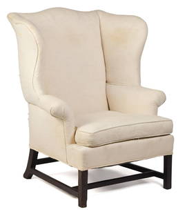 18TH C. CHIPPENDALE WING CHAIR.: A ca. 1780-1800 Chippendale walnut wing chair, with a serpentine crest with bow shaped wings on a stretcher base with Chinese Chippendale carved front legs, upholstered in ivory matelesse 43”H x