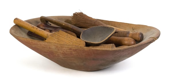 ANTIQUE RED CHOPPING BOWL WITH WOOD IMPLEMENTS.