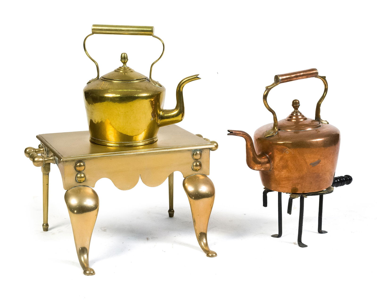 19TH C. BRASS & COPPER HEARTH ITEMS, 4 PCS.: 19th C. hearth accessories, including copper and brass kettles, 12”H, a brass footman 11”H x 20”W x 12”D, and a lyre formed trivet, 6”H x 11”W. Provenance: Property