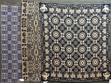 THREE ANTIQUE HOMESPUN COVERLETS.
