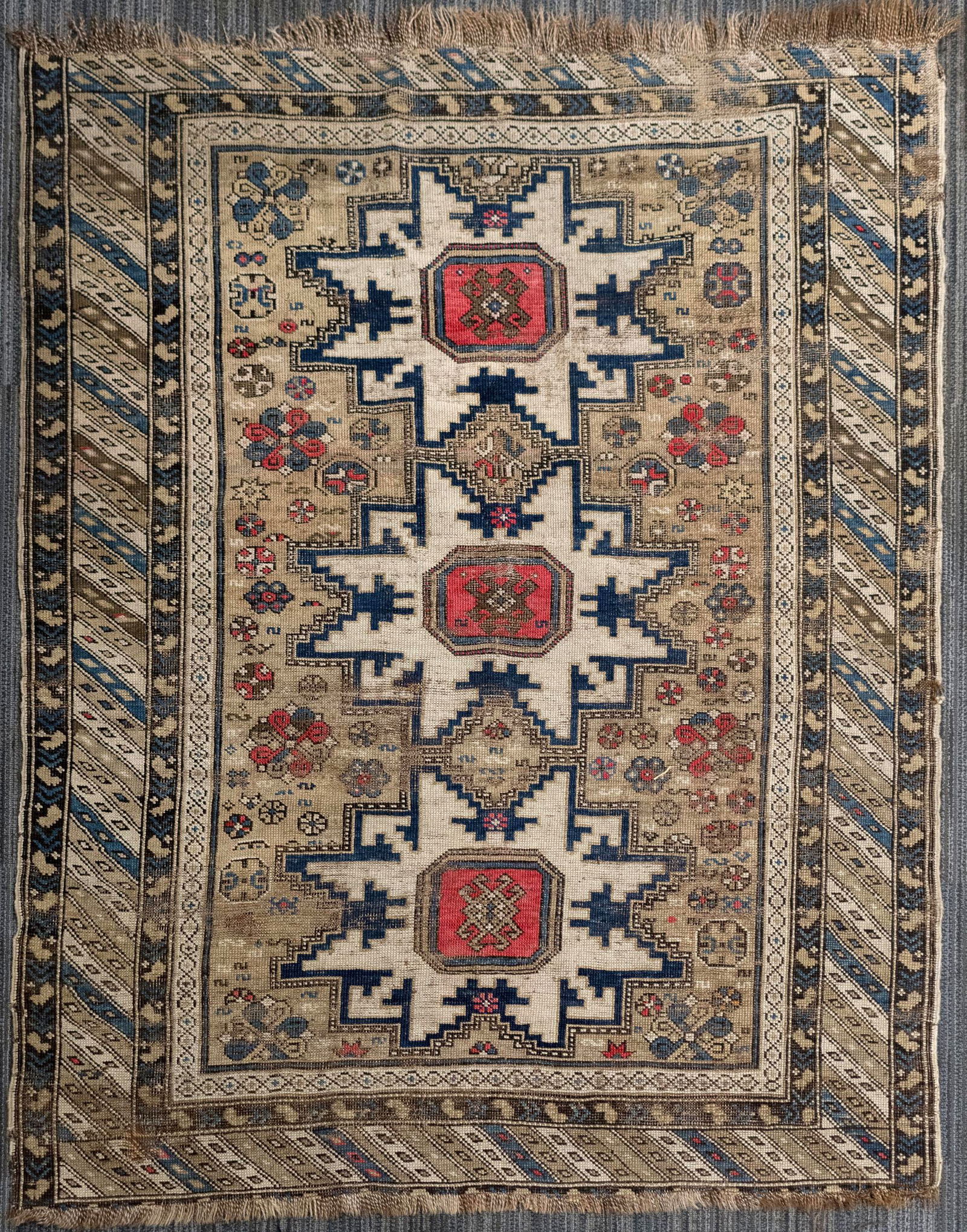 ANTIQUE KUBA ORIENTAL SCATTER RUG. (1 of 5)