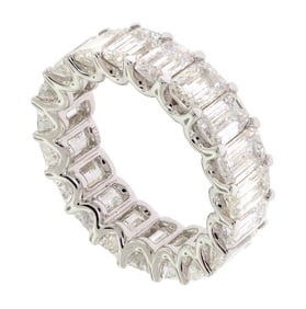 PLATINUM 10 CT. TW. EM. CUT DIAMOND ETERNITY BAND.