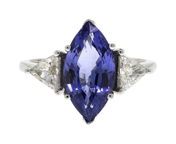 PLATINUM MARQUISE SAPPHIRE & TRIANGLE DIAMOND RING.