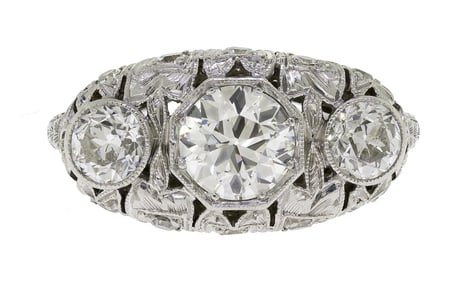 ANTIQUE PLATINUM FILIGREE 3-STONE DIAMOND RING.
