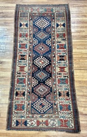 ANTIQUE CAUCASIAN ORIENTAL RUNNER.