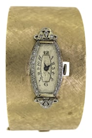 VINTAGE 14K WIDE GOLD BANGLE W/ PLAT. & DIAM. WATCH.