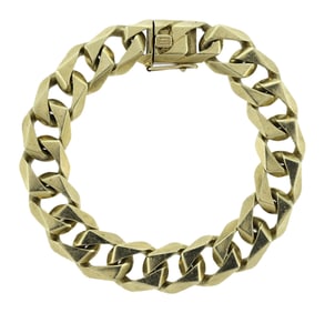 VINTAGE 14K YELLOW GOLD ANGULAR CURB STYLE BRACELET.