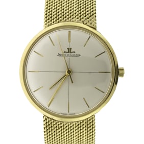VINTAGE 18K GOLD JAEGER LECOULTRE WRIST WATCH.