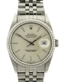 MEN'S STAINLESS STEEL ROLEX OYSTER W/ DATE.