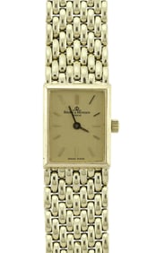 VINTAGE 14K GOLD BAUME & MERCIER WRIST WATCH.