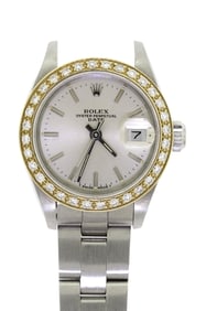 LADYS STAINLESS STEEL ROLEX W/18K DIAMOND BEZEL.