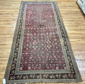 ANTIQUE ORIENTAL RUG.
