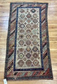 ANTIQUE CAUCASIAN ORIENTAL RUNNER.
