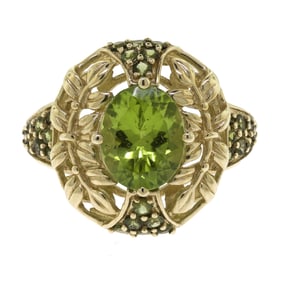 14K GOLD GREEN TOURMALINE RING.
