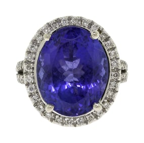 14K GOLD TANZANITE & DIAMOND RING.