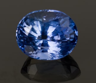 LOOSE 6.65 CT. OVAL BLUE SAPPHIRE.
