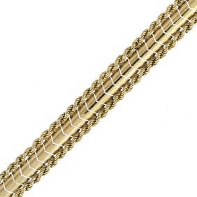 VINTAGE 18K YELLOW GOLD WIDE BRACELET.