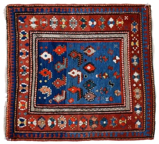 ANTIQUE ORIENTAL SCATTER RUG.