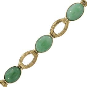 VINTAGE 18K GOLD JADE ENGRAVED OVAL LINK BRACELET.