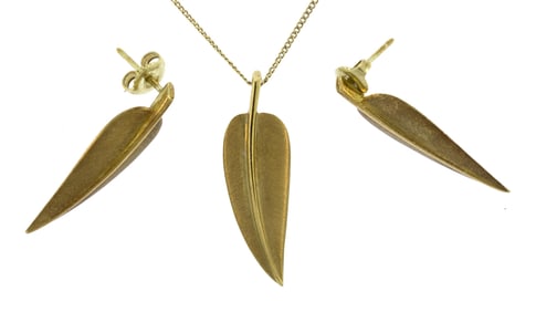 TIFFANY & CO. A. CUMMINGS 18K GOLD LEAF SUITE.
